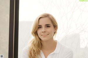 A woman in a school uniform posing for a picture.